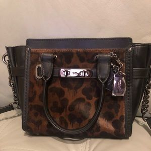 NWT COACH Swagger 21 Haircalf DK/Wild Beast